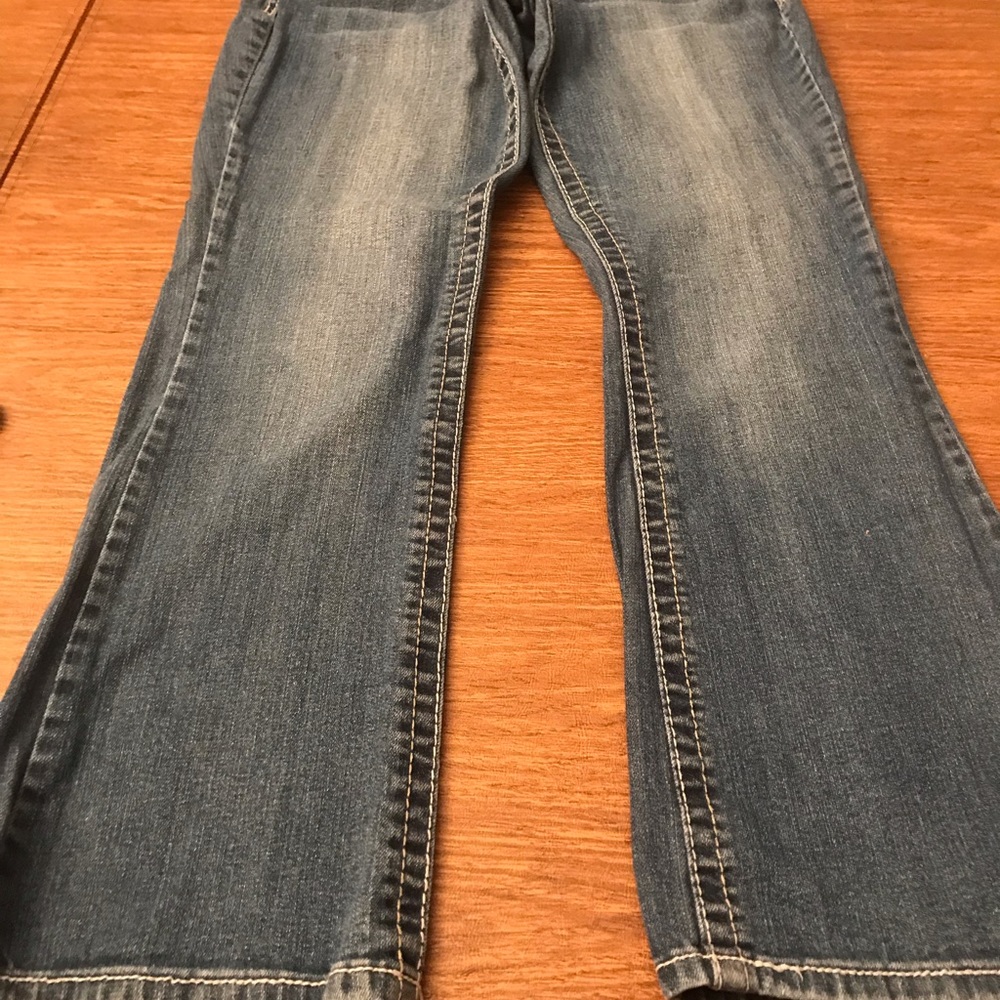 Maurice’s curvy fit faded boot cut jeans